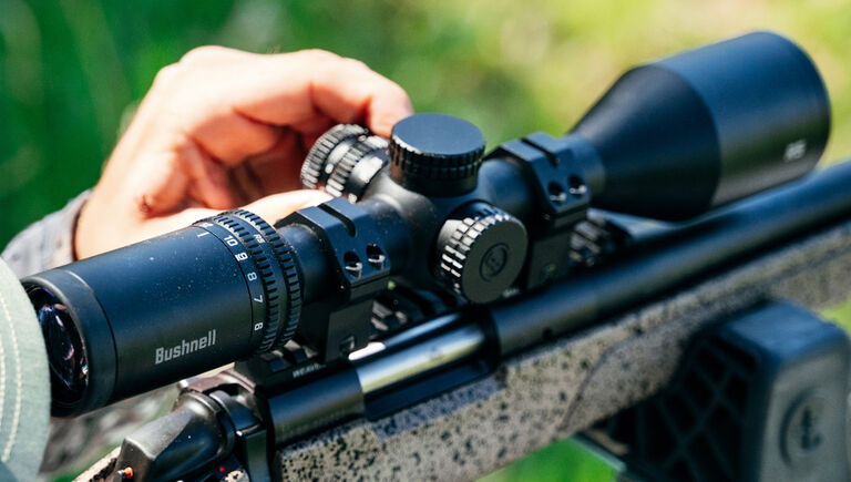 Man shooting with riflescope